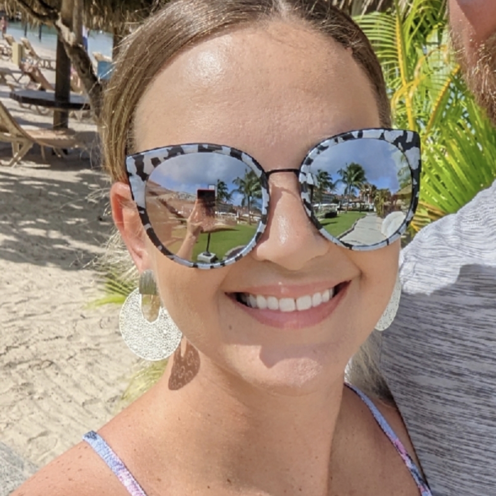 Women's oversized gray and black tortoise sunglasses